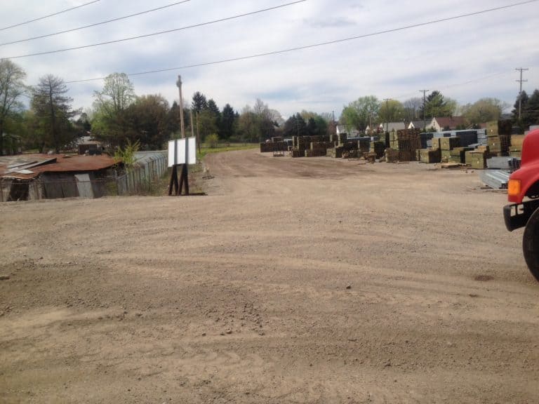 Cleaned industrial yard representing dust suppressant services